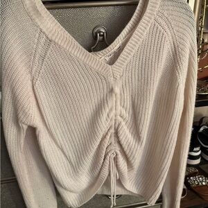 Elegant V-Neck Cream Sweater with Drawstring
